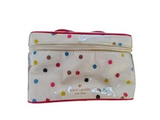 The item is a Kate Spade New York polka dot cosmetic bag