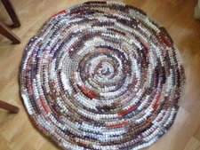 33" multi-colored brown, orange, cream & tan round crocheted rag rug, handmade