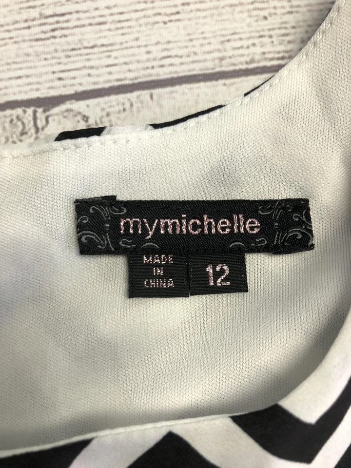 Рубашка My Michelle молодежная 12 черная белая с шевроном зигзагообразными рукавами-затяжками сзади топ на молнии - Изображение 3 из 4