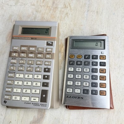 Vintage Texas Inst. BA-35 & Lloyds Model E615-2 Calculators Lot Of 2 With Sleeve