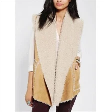 Hem & Thread size Medium/large faux sheepskin vest