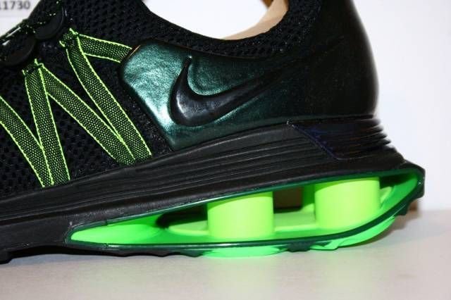 nike shox gravity black green