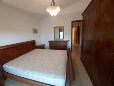 camera da letto in legno massello