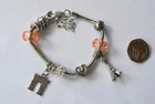 French Theme White Metal Charm Bracelet with Metal Charms and Beads