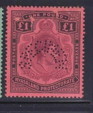 NYASALAND, 1938 KGVI One Pound Purple & Black on Red perf. SPECIMEN, mnh, scuffs