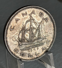 Canada 1949 0.800 Silver Dollar Floreat Terra Nova. Toned EF Underlying Lustre