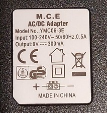 Netzteil 9V/300mA Type: YMC06-3E AC/DC Power Adapter  gebraucht.