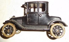 ARCADE ---- 1925 MODEL T Ford COUPE with painted wheels - cast iron antique toy
