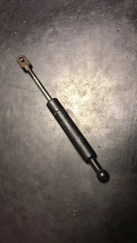 Rear window gas strut