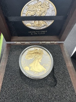 Only 2 Remaining! - 2025 American Silver Eagle w/Diamond Dust & 24-Kt Gold BU