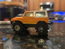 VINTAGE SCHAPER STOMPER ORANGE 4x4s JEEP RENEGADE TRUCK DOESN'T WORK PARTS READ