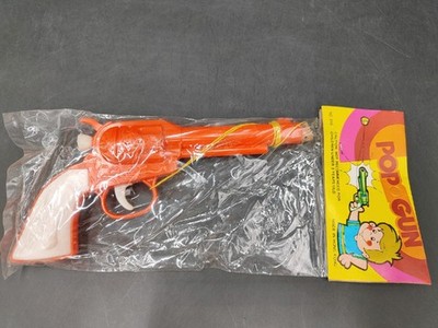 Vintage Sock'em Rocket Pop Gun Toys Hong Kong Orange