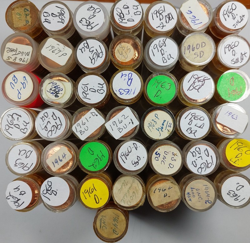 A HUGE LOT OF 52 ROLLS OF UNCIRCULATED LINCOLN CENTS  FROM 1960 TO 1969