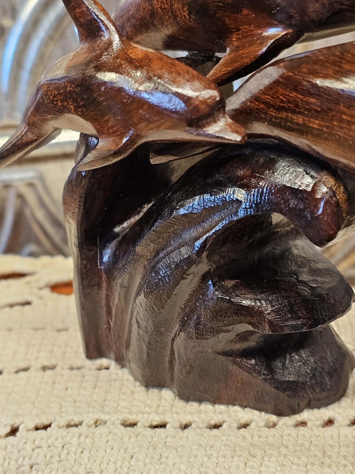 Trio Of Dolfins Riding A Wave, Ironwood Statue