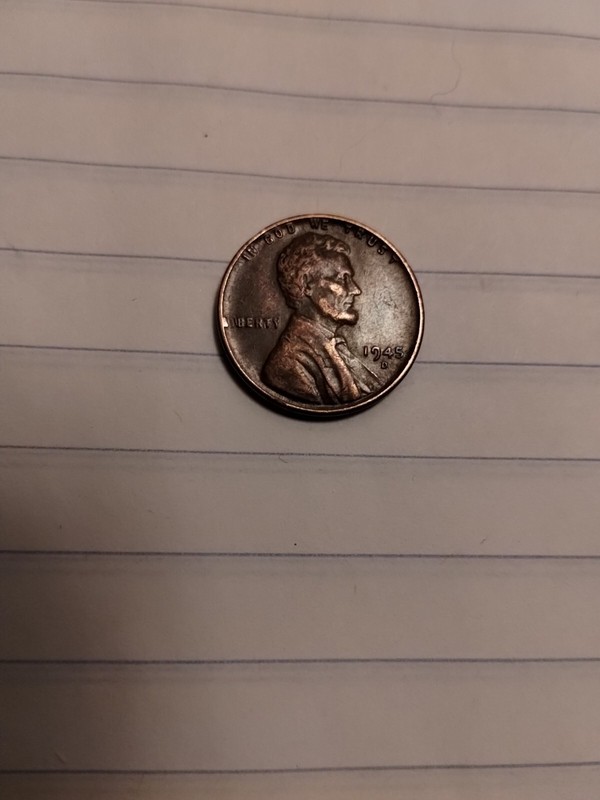 1945 D Penny,L(Liberty) Close To The Rim +10 random mint condition sport cards.