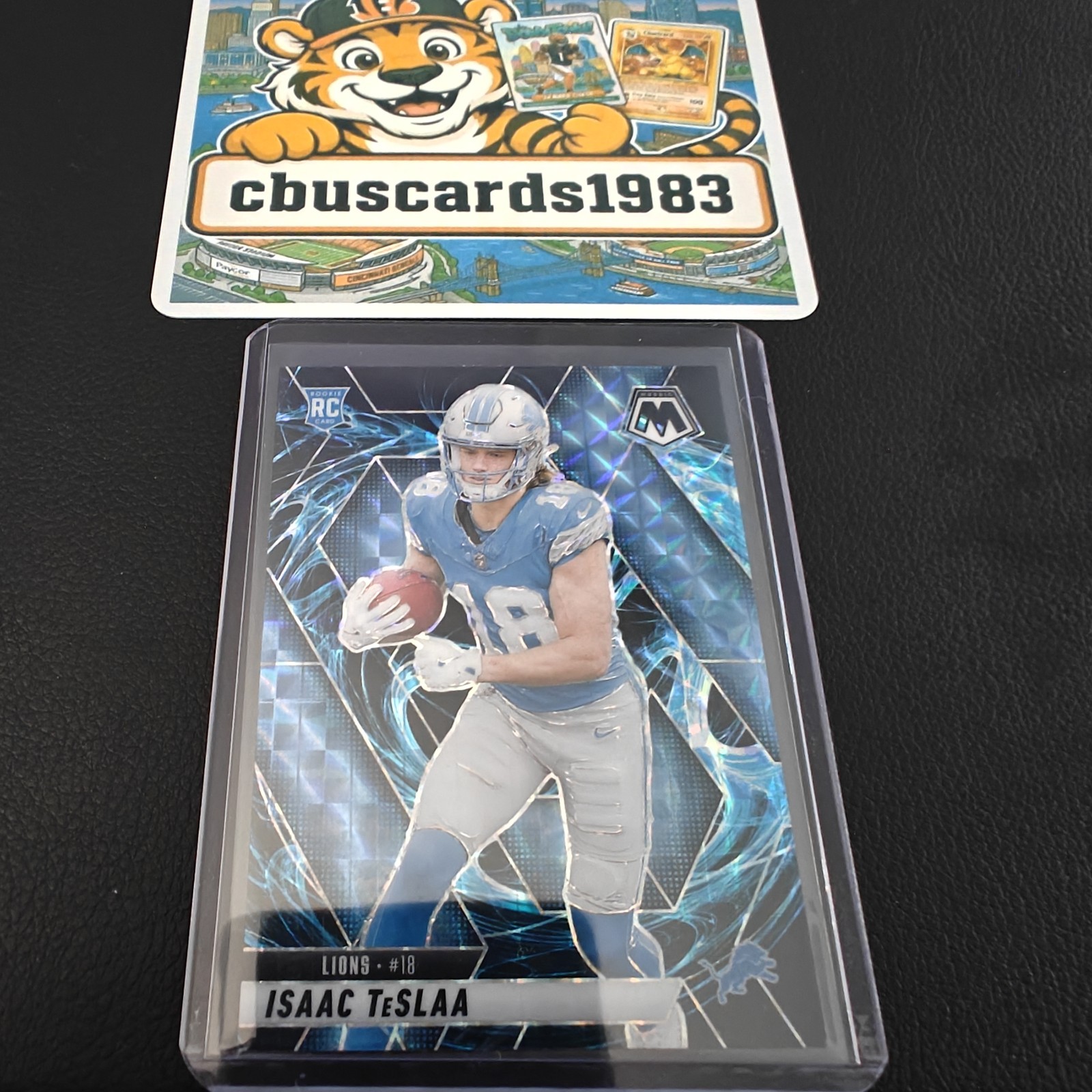 2025 Panini Mosaic - Rookies Isaac Teslaa #319 Genesis Mosaic Prizm (RC)