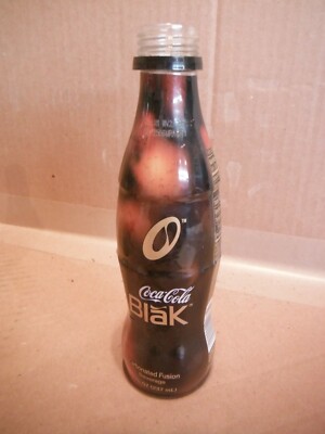 COCA COLA BLACK PLASTIC WRAP 8 OZ SODA BOTTLE~2000COCA COLA CO. #64