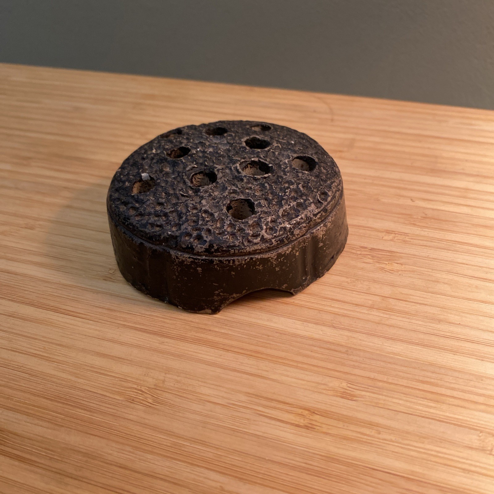 Vintage Black Pottery 10 Hole Flower Frog Made in Japan 3” x 1”