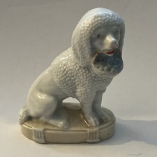 Porzellanfigur Puffhund Kapitänshund Kaminhund  Porzellan Hund Antik