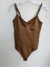 OQQ Womens Ribbed Knit Sleeveless Bodysuit Brown Crew Neck Snap Closure Medium