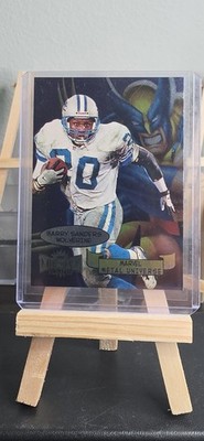 1997 Fleer Metal Universe Barry Sanders #1 Marvel Metal Wolverine Lions