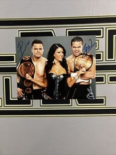 Autographed WWE 8x10 Primo and Epico The Colons with Rosa Dual Signed Tag Champs