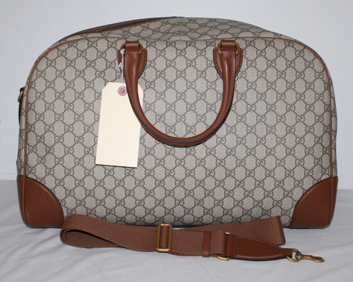 NEW Gucci GG Monogram Emblem Travel Duffle Bag Brown Leather Carry On 821148
