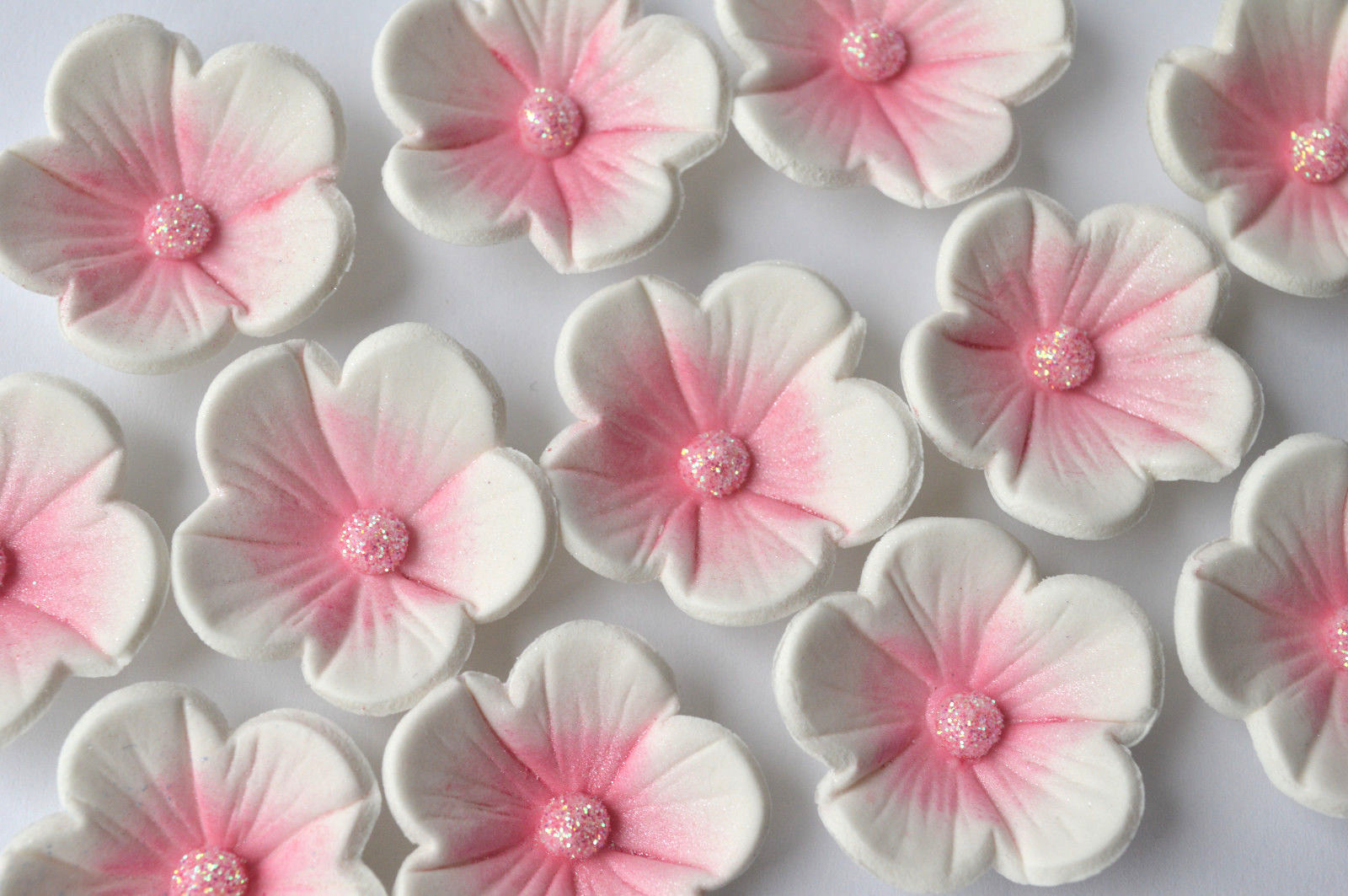 12 edible pink & white blossom birthday cake flowers. Edible flower