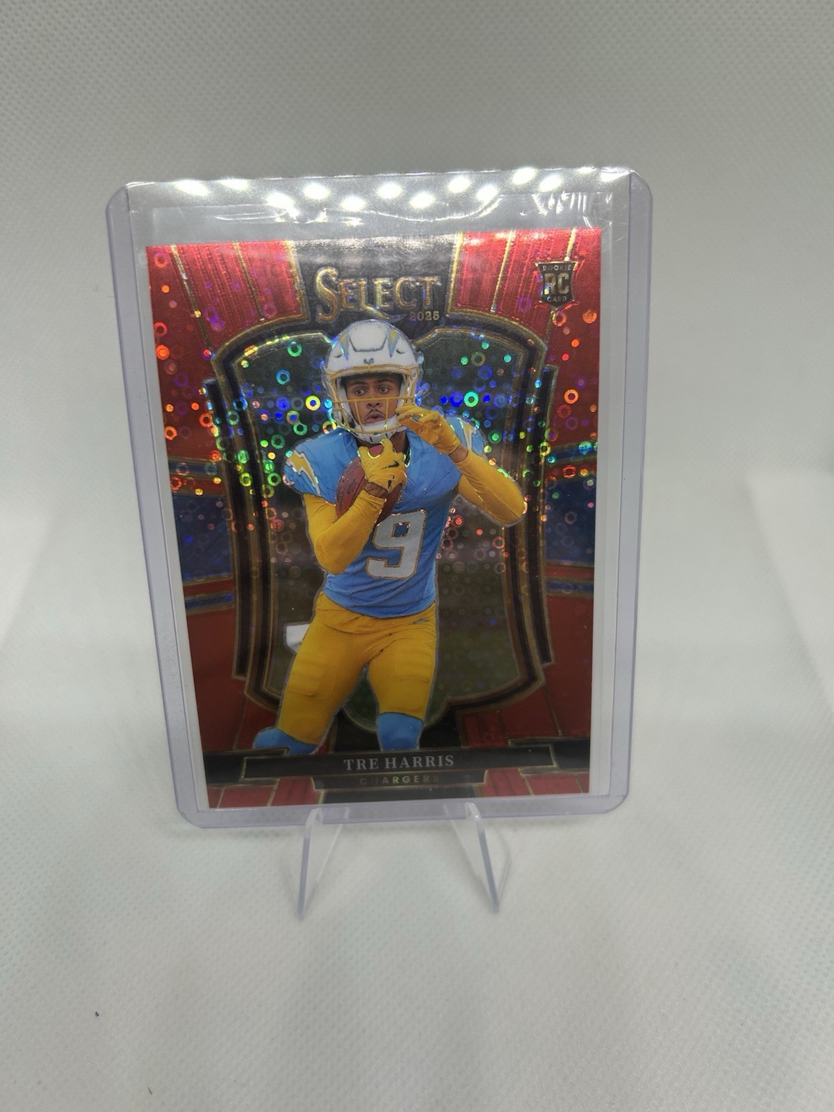 2025 Select International-Premier Rookie Tre Harris Red Disco Prizm /49 (RC)