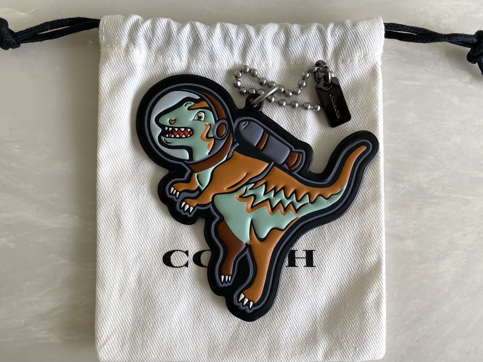 COACH SPACE REXY SADDLE/MULTI LEATHER BAG CHARM HANGT… Gem