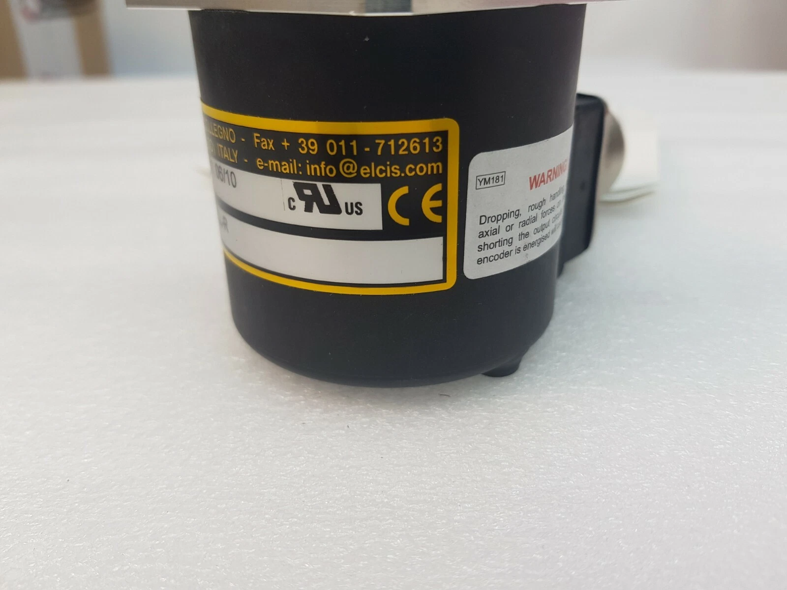 ELCIS encoder body with CE and cURus marks and handling warning label