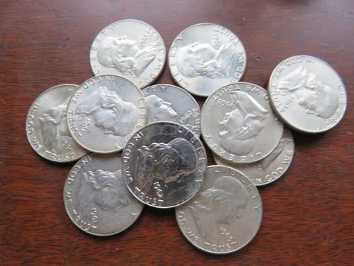 Partial Roll of  11 90% silver halves.  AU Ben Franklins (11)  5.50 face