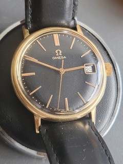 OMEGA montre mécanique plaqué or cadran noir date réf 132.019 cuir noir