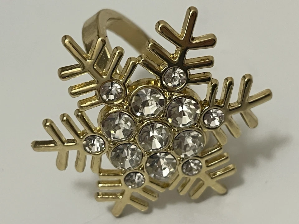 Juego de 8 y 1 extra servilleteros copo de nieve chapados en oro y diamantes de imitación Foto 3 de 4