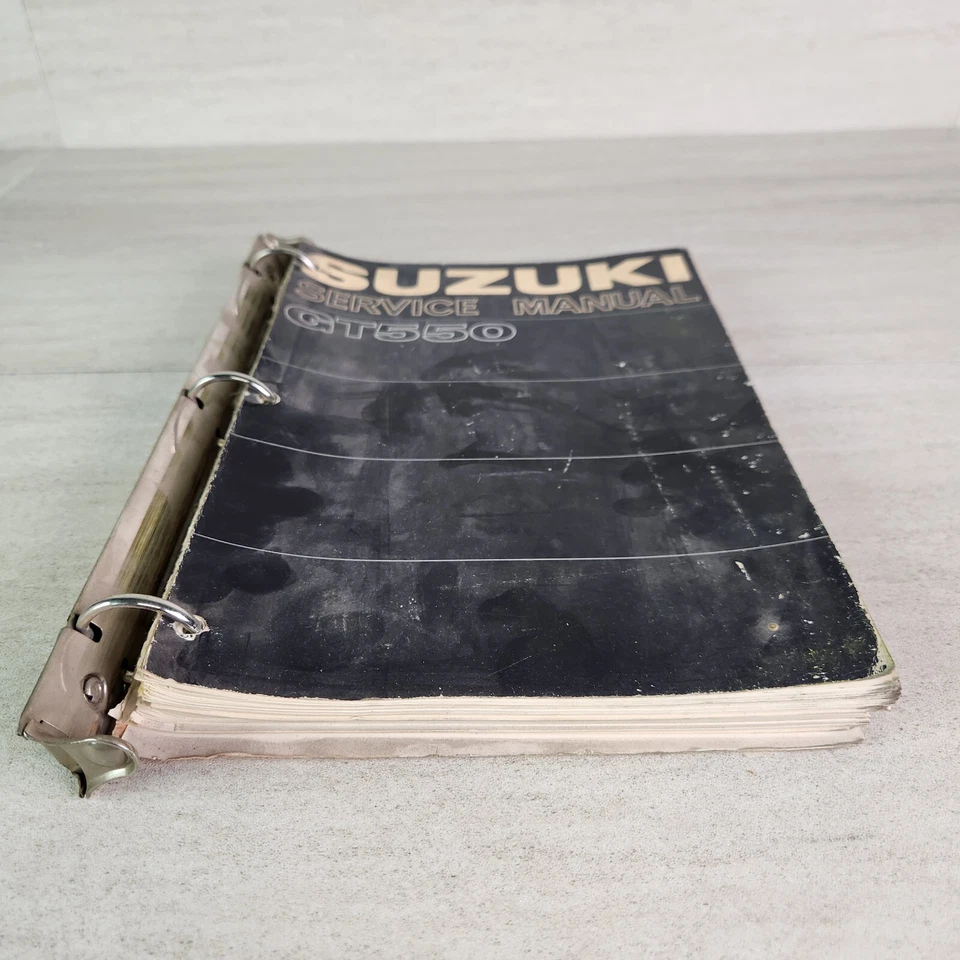 Manual de servicio Suzuki GT550 + libro de equipo eléctrico OEM 1973 anillos de carpeta Foto 3 de 4