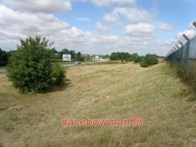 PHOTO  THE PERIMETER OF ALCONBURY AIRFIELD LIMITED OPPORTUNITIES FOR PHOTOGRAPHY
