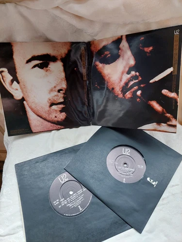 Sunmer Sale U2 Vinyl Lot- Unforgettable Fire Double 45 & Wide Awake In America