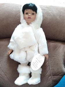 porcelain eskimo doll