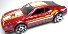 2015 HOT WHEELS BMW M1 RED 1:64 DIECAST 2 3/4" CAR WITH WHITE & YELLOW STRIPES