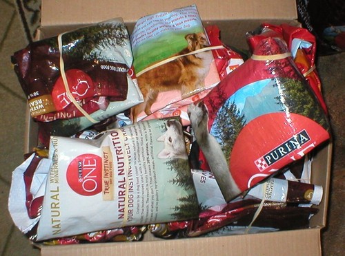 12 EMPTY PURINA ONE DOG FOOD BAGS FOR REPURPOSING LOT SOLD AS IS