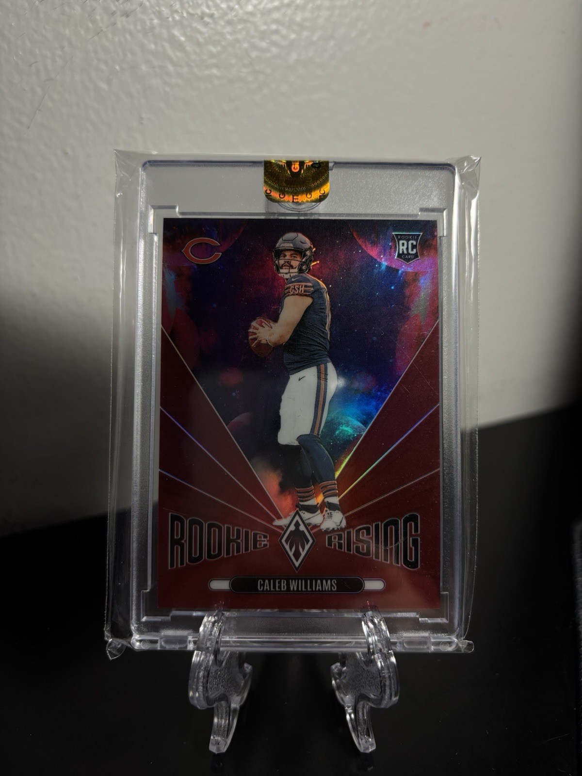 2024 Panini Phoenix - Rookie Rising Caleb Williams #RR-CWS Red /99 (RC)