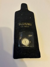 Suzuki - Vintage ladies round black and gold wristwatch - Untested