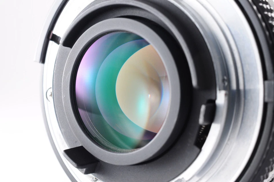 **LENTE COMO NUEVO** Cámara fotográfica Nikon FE 35mm SLR plateada + Ai 50mm f/1.8 + tapa de JPN Foto 4 de 4