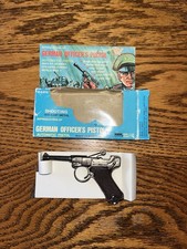 VINTAGE TOY CAP PISTOL IN ORIGINAL PACKAGE