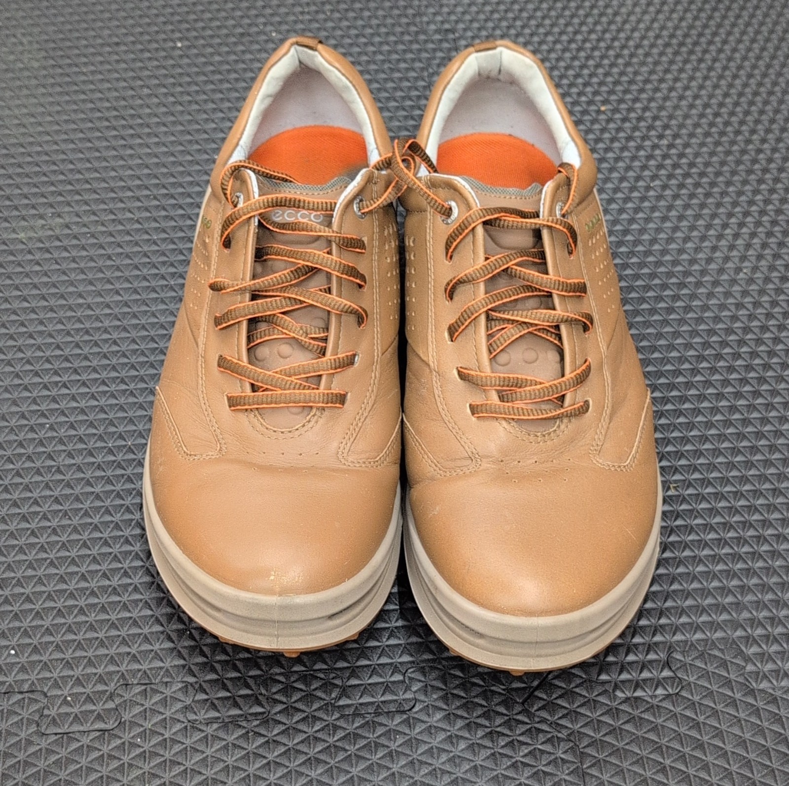 Athletic Sneakers Orange Sole Spikes.