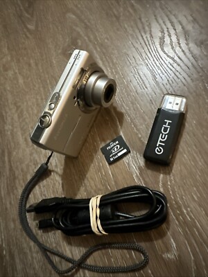 Olympus FE-190 6MP Digital Camera With 1GB Memory Card And Card Reader