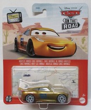 2023 DISNEY PIXAR CARS  D CASE  RUSTEZE DINOCO CRUZ RAMIREZ DINCO GOLD
