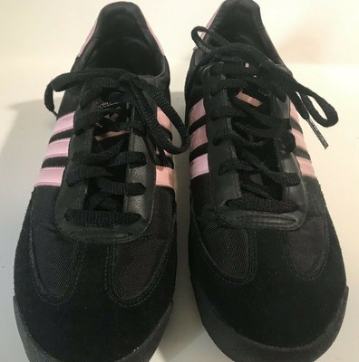 black adidas shoes with pink stripes