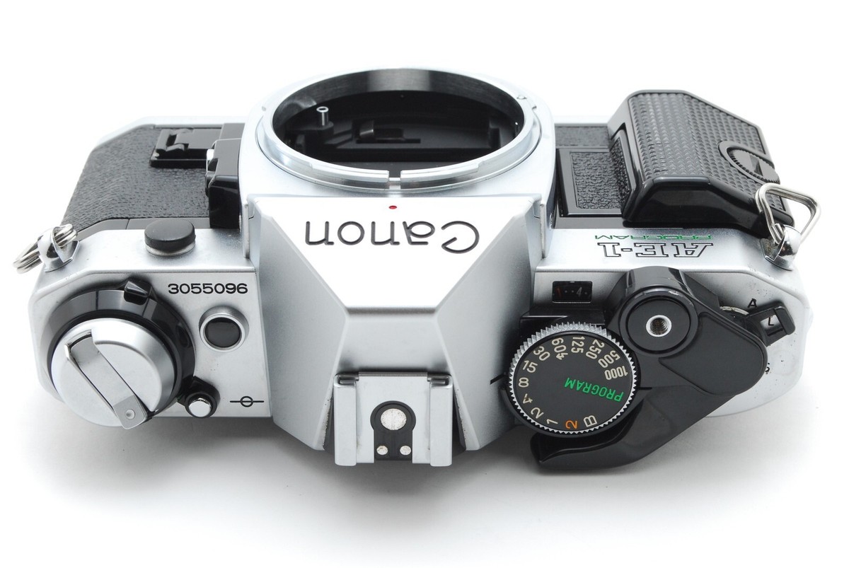 【良品】Canon AE-1 PROGRAM＆New FD 50mm f1.4 Canon AE-1 Program Chrome 35mm Film Camera w/ 50mm f1.4 Lens -New Seal