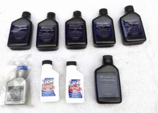 LOT of 12 HUSQVARNA and LUCAS 2-stroke oil bottles - 6.4 oz. and 2.6 oz bottles